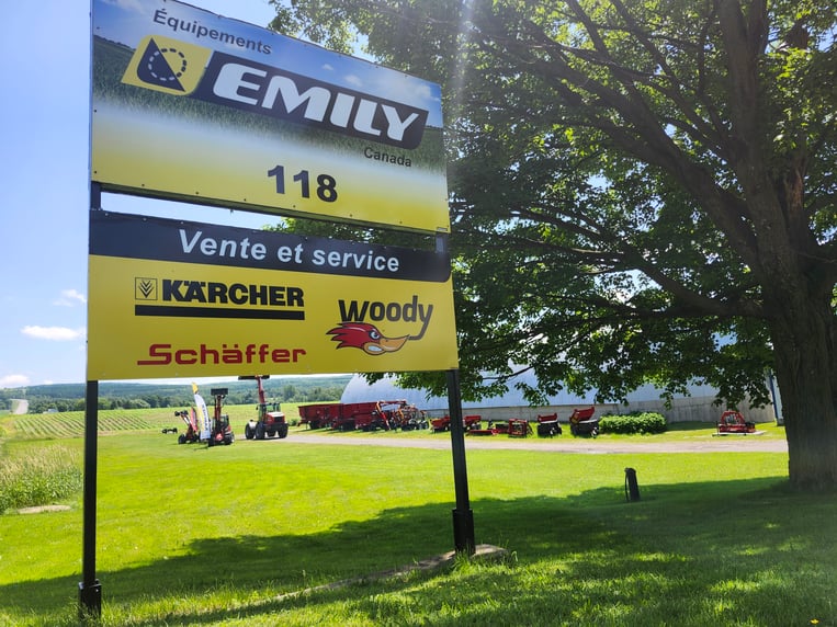 a sign showing what product Équipments Emily Canada sells