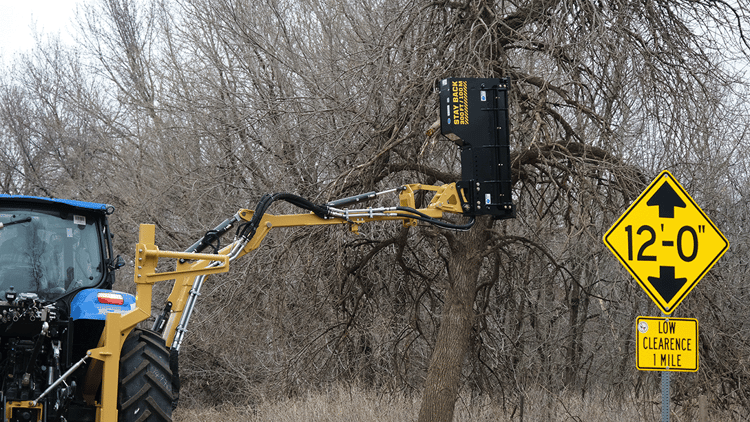 TR Boom Drum Mulcher DC cutting roadside tree