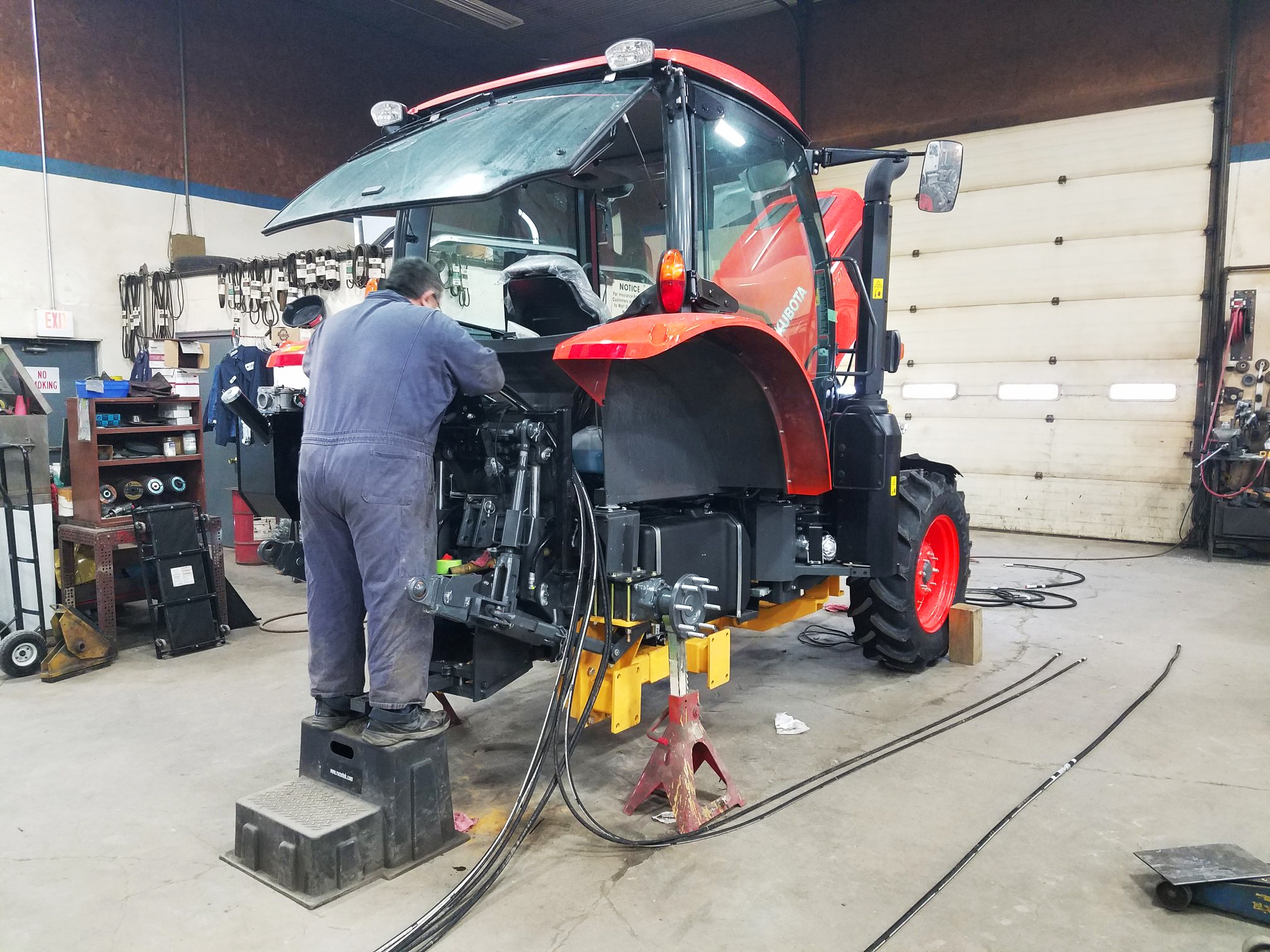 Man Working on Tractor Mower