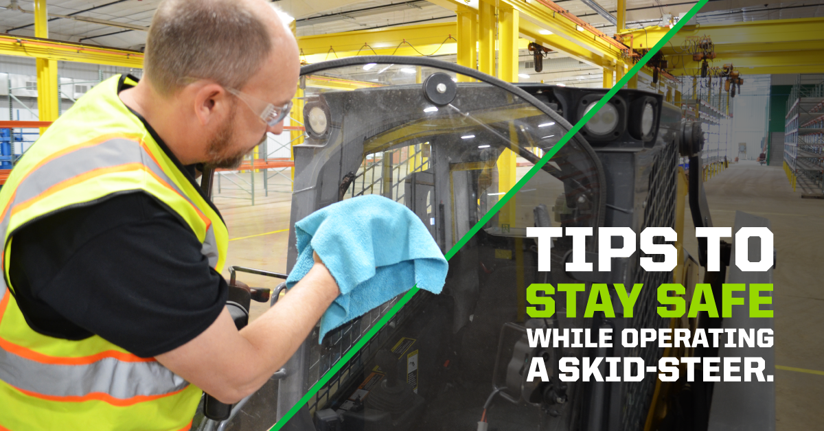 Man Cleaning Lexan Glass on Skid-Steer