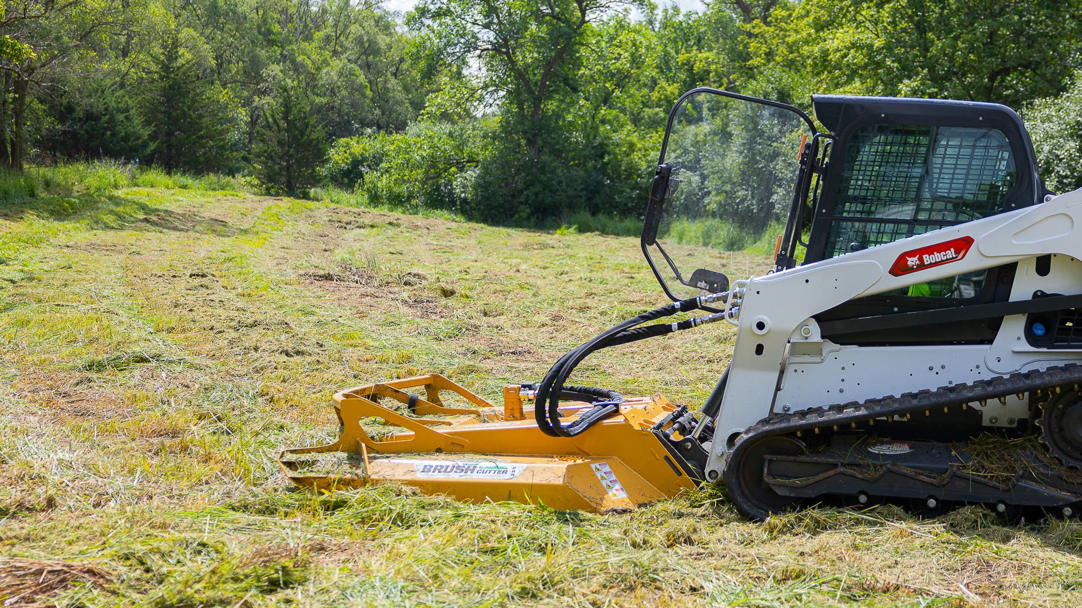 skid steer in a field