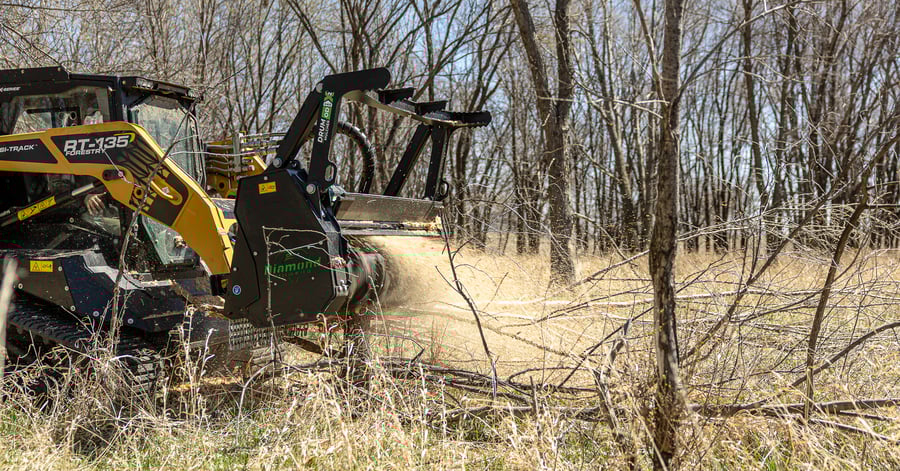 skid steer drum mulcher od pro x 2 mulching a tree